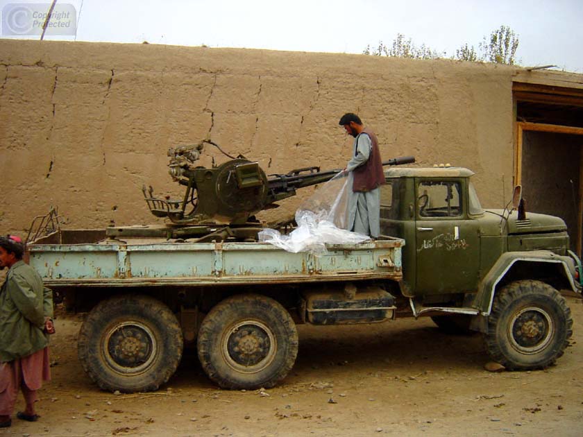 Gun on back of Truck